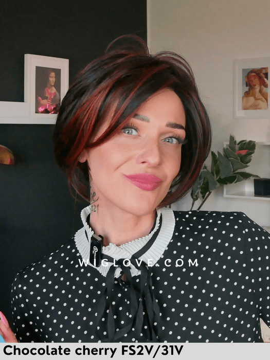 ignite jon renau parrucca corta scalata in fibra sintetica termoresistente piastrabile piega liscia lacefront fatta a macchina attaccatura naturale retro aperto